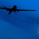 An unmanned US Predator drone flies over Kandahar Air Field, southern Afghanistan, on a moon-lit night. (Image: AP)